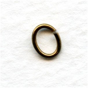 oval-jump-rings-oxidized-brass-7x5mm-100