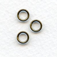 Soldered Jump Rings Oxidized Brass 7mm (25)