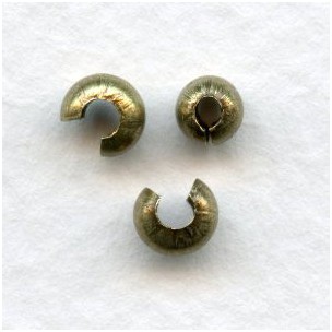^Crimp Knot Covers Makes a 4mm Bead Oxidized Brass