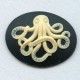 ^Octopus Cameo Ivory on Jet 30x40mm (1)